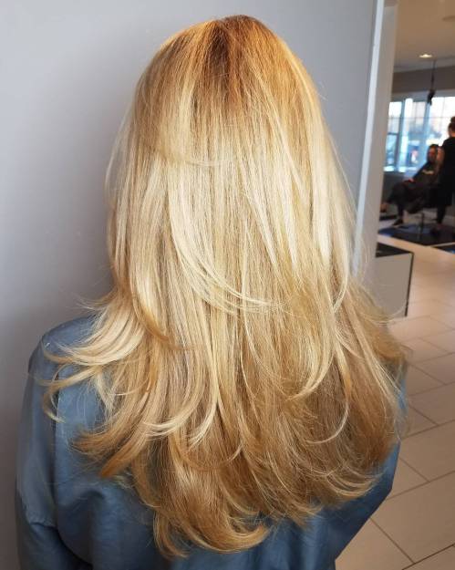 Long Layered Strawberry Blonde Hairstyle
