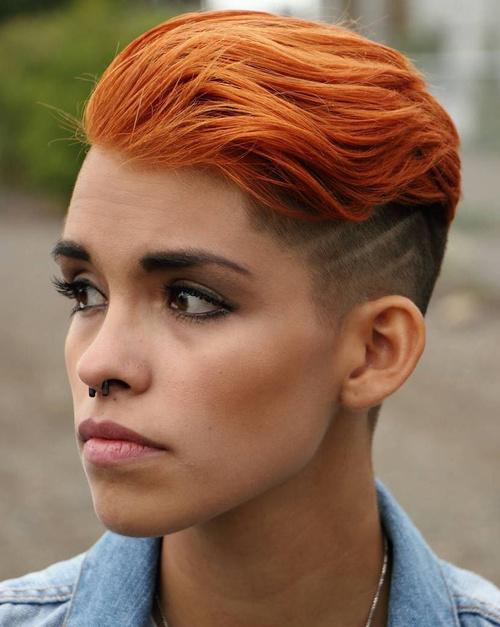 red hairstyle with side undercut for women