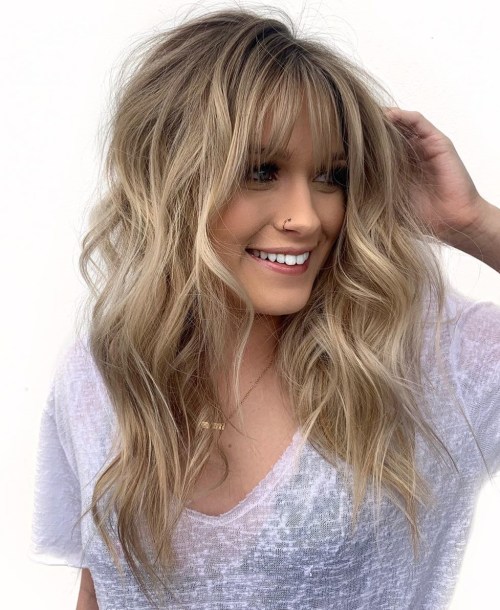 Long Layered Hairstyle With Cute Bangs