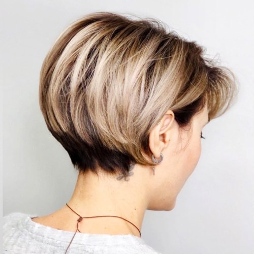 Ear Length Blonde Wedge Cut with Dark Roots