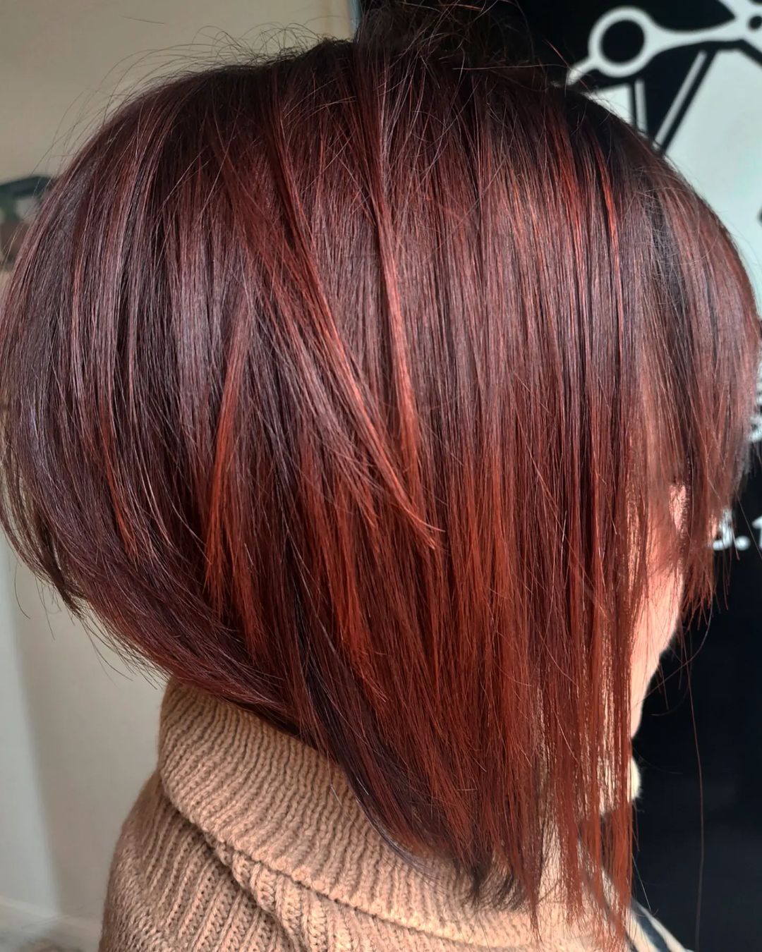 Stacked Bob with Balayage in Deep to Vibrant Red Tones