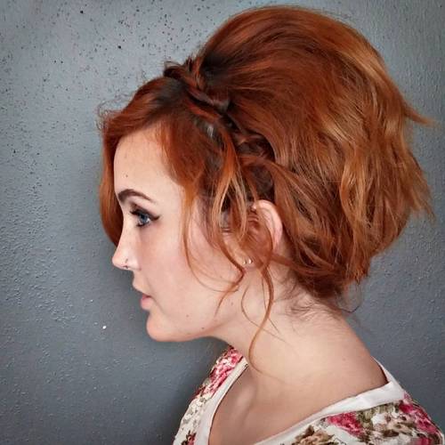 red tousled hairstyle with a headband braid