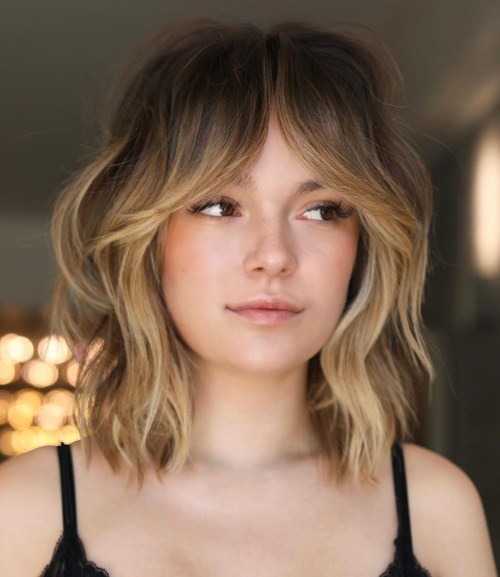 Short Hair with Bottleneck Bangs and Blonde Highlights