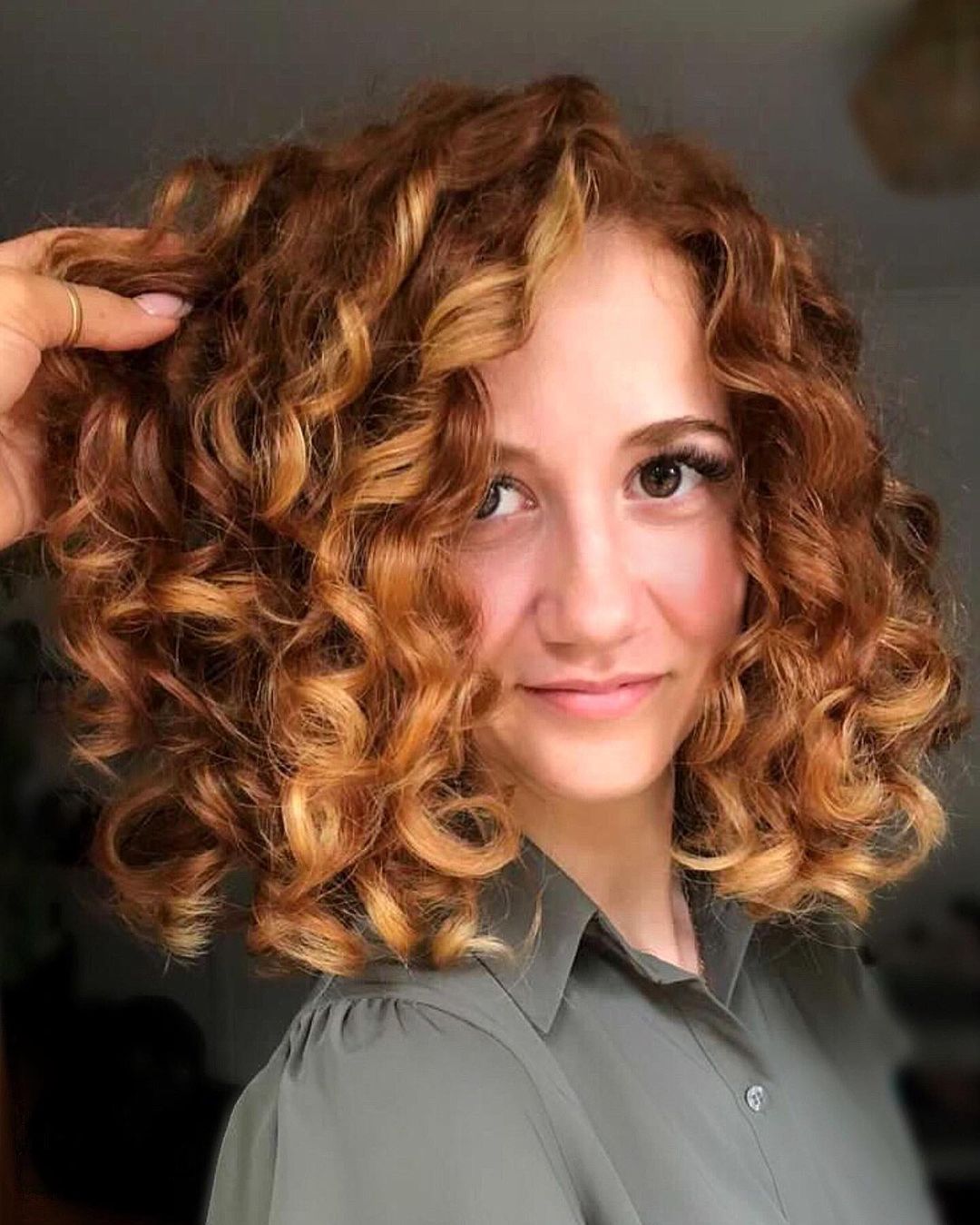 Naturally Curly Auburn Hair with Golden Highlights