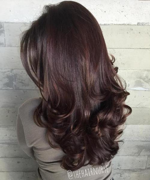 Long Curled Brunette Hairstyle With Layers