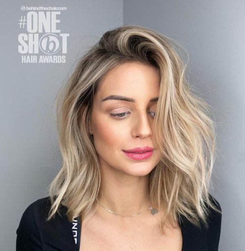 Long Side Part Bob with Loose Waves and Blonde Balayage