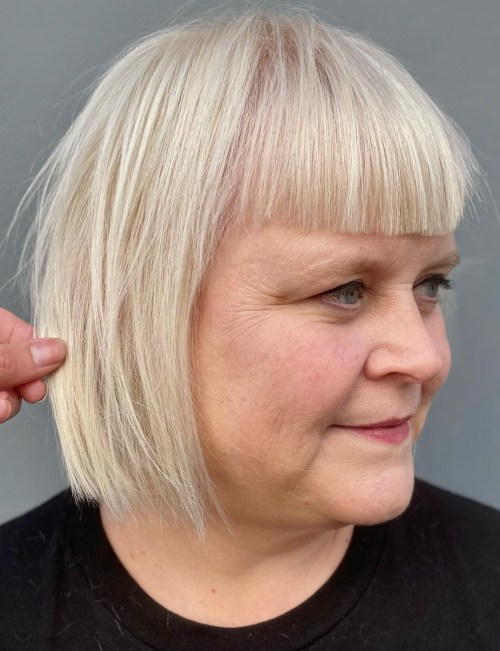 Platinum Blonde Bob with Bangs for Round Faces