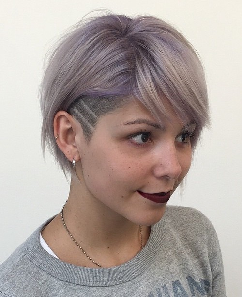 short women's hairstyle with temple undercut