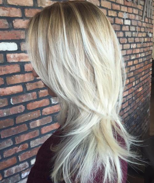 Blonde Layered Hair With Root Fade