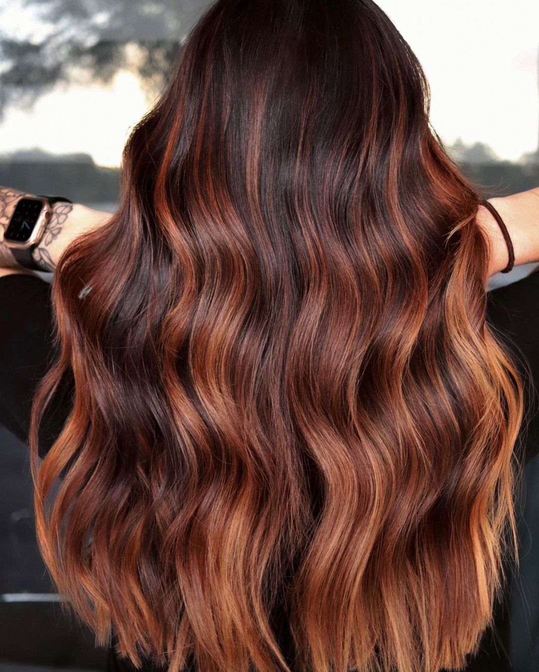 Dark Hair with Balayage in Different Shades of Red