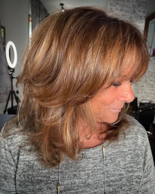 Voluminous Layered Hairstyle for an Older Woman