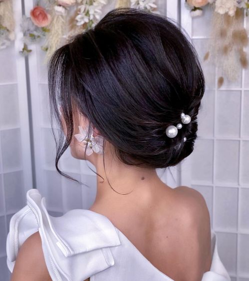 Low Updo with Pearls for Mid-Length Hair
