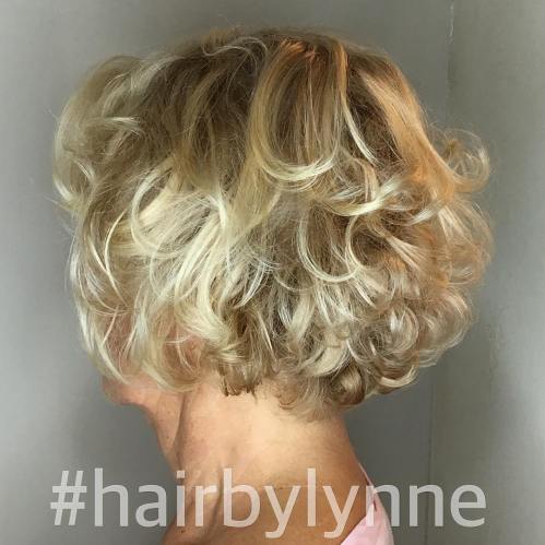 Short Curly Blonde Hairstyle For Over 60